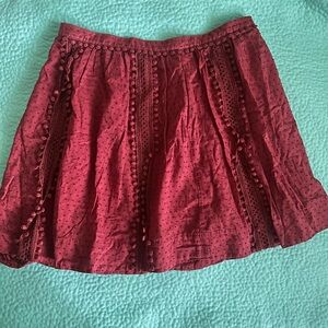 J. Crew Swiss Dot Pom-Pom
Skirt in Dusty Pomegranate